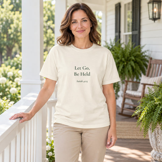 Let Go, Be Held Scripture tee in Ivory — worn