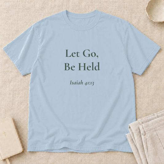 Let Go, Be Held Scripture tee in Chambray — styled flat lay