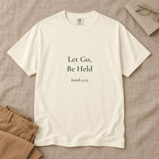Let Go, Be Held Scripture tee in Ivory — styled flat lay