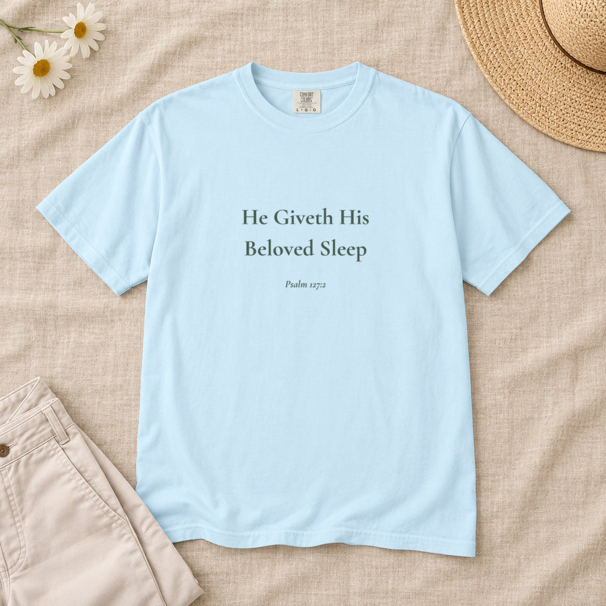 He Giveth His Beloved Sleep Scripture tee in Chambray — styled flat lay
