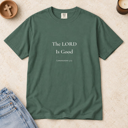 The LORD Is Good Scripture tee in Blue Spruce — styled flat lay