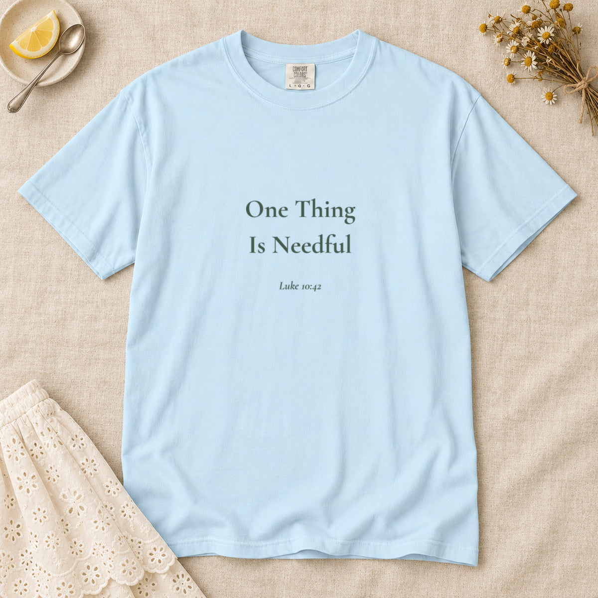 One Thing Is Needful Scripture tee in Chambray — flat lay
